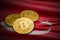 Close-up gold colored bitcoin coin on Turkish flag