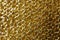 Close Up Of Gold Fabric Chain mail Sewing