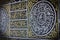 Close up golden arabic calligraphy in black silk cloth kiswah cover of holy kaaba`s door