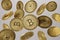 Close up of golden bitcoins tossed into the air as example for blockchain and crypto-currency concept