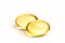 Close up golden color oil supplements in soft gel capsule, healthy product concept