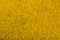 Close up of golden colored felt textile for background