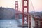 Close up golden gate bridge in san francisco,boat on the ocean