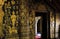 Close up of golden ornamented temple wall - Wat Xieng Thong, Luang Prabang