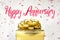 Close up Golden present box with Happy Anniversary word and confetti blur background