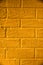 Close up of golden shade brick wall texture background