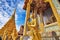 Close-up golden statue of Kinara at Wat Phra Kaew in Grand Place Complex in Bangkok, Thailand