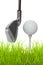 Close up of a golf club with ball and tee