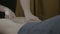 Close up of a good looking woman getting a legs massage at the spa from a male masseur -