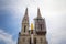 Close up on the gothic clocktower of Zagrebacka Katedrala, or Zagreb cathedral, in afternoon from Kaptol district.