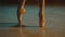 Close up graceful ballet dancer feet in pointe shoes