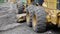 Close-up grader tractor wheel on construction site. Russia, Stavropol, 10.06.20.