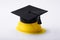 Close-up Of Graduation Hat On Yellow Hardhat
