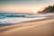 Close up of grains of beach sand with views of sea waves and sunset views