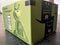 Close-up of Green Amazon Prime Box with Grinch Movie ad