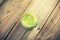 Close up of green fresh smoothie on old wooden dark background