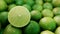 Close up of the green lime in a kitchen. Lime is a kind of fruit.