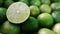 Close up of the green lime in a kitchen. Lime is a kind of fruit.