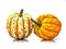 Close-up of a green orange Carnival or Festival pumpkin isolated on a white background.