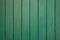 Close up of green painted wooden background - texture