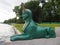 Close up of green sphinx sculpture at the pier on the Malaya Nevka river embankment