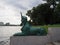 Close up of green sphinx sculpture at the pier on the Malaya Nevka river embankment in Saint Petersburg