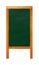 Close up green standing blank clean chalkboard menu in brown wooden frame isolated