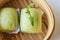Close up green tea buns in bamboo basket