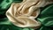 a close up of a green and white silk fabric with a knot