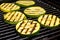 close-up of grill marked zucchini slices on a grill pan