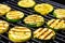 close-up of grill marked zucchini slices on a grill pan