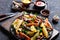 Close-up of grilled sliced veggies on a board