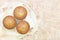 Close up group of banana cup cake bakery on wood plate top view with ribbon look delicious on wooden table background