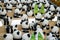 Close-up of a group of ceramic graffiti panda dolls