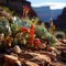 Close up of a group of green echeveria cactus with bright red flowers.