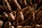 Close up of a group of many bread loaves and baguettes with warm and soft natural light in a bread bakery shop