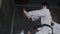 Close up. Group of titul taekwondo male sportsmans perform spectacular original fight stance. Guys break and crash