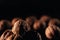 Close-up of a group of walnuts on a black background