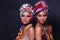 Close Up half body of 20s Asian two Woman with Fashion make up African hill Tribe style