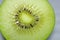 Close up of half cutted kiwifruits from New Zealand. Background of fresh and juicy golden green kiwis for healthy smoothies