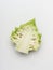 Close up of half head of Romanesco broccoli cabbage on white background