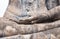 Close up hand of ancient statues buddha at Sukhothai Historical