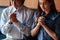 Close up hand. Asian Christian woman and man holding hands in praying for Jesus` blessings to show love and confession of their