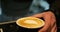 Close up hand barista makes coffes in coffee bar. Close-up Slow Motion of Grinder Stuffing Roasted Coffee from Coffee
