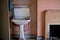 Close up of hand basin and oxidised water heater in derelict house built in 1930s deco style, Rayners Lane, Harrow UK