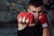 Close-up of hand of boxer ready for a fight.Strong arms and clenched fists