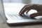 close up.hand of a businessman pressing button on laptop keyboar