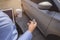 Close-up of the hand, Businesswoman opening the car door with coffee cup and laptop