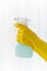 Close up of hand with cleanser spraying