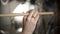 Close-up of hand with drumstick. Action. Female hand professional drummer holds wooden drumstick before playing at music